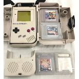 GAMEBOY WITH GAMES. Comes with a Gameboy carry-all plus Games.