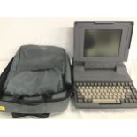 TOSHIBA T3100e. This unit comes with a portable carry case.