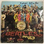 THE BEATLES LP RECORD SIGNED BY SIR PETER BLAKE. A copy of ‘Sgt Peppers Lonely Hearts Club Band’