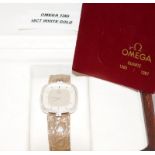 Omega 18ct white gold diamond bezel watch, boxed with some papers.