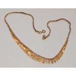 Three colour 9ct gold Cleopatra necklace. 16" long and 7.8g (B)