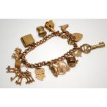 9ct gold charm bracelet including 12 charms. Total weight 34.5g