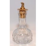 Cut glass vinegar/oil condiment bottle with sterling silver top and grouse head finial. Hallmarked