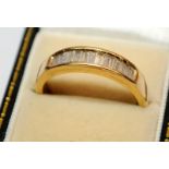 18ct gold ring size V with baguette diamond band Total weight 5.8g