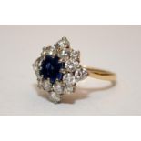 18ct gold Art Deco large diamond cluster ring around a centre sapphire of approx 1ct. Size M 1/2 and