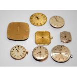 Collection of Omega watch movements and dials. Eight in lot