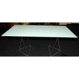 A designer glass top dining table 75x180x90cm