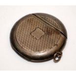 Antique sterling silver vesta case in unusual circular form with clear cartouche. Hallmarked for