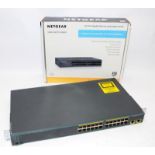 Netgear GS324 24 port gigabit ethernet unmanaged switch c/w Cisco Catalyst switch C2960-24TT-L.