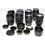 A quantity of Canon EF zoom lenses, mostly 24-105mm. All require attention and are being offered for