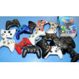 Various gaming controllers to include Xbox and PlayStation.