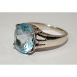 A 925 silver and icy blue topaz ring Size L