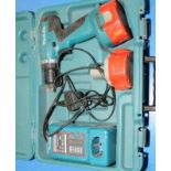 A boxed Makita drill with battery and charger (untested)