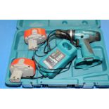 A Makita 8319D drill in case with batteries and charger (untested)