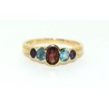 9ct gold multi gem set ring ,Garnet,Topaz, Amethyst size M