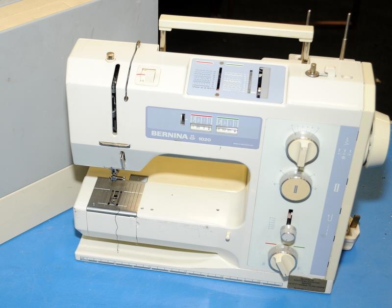 A Bernina sewing machine in case.