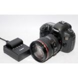 Canon 5Ds DSLR camera with fitted Canon EF 24-105 zoom lens. Comes complete with battery and charger