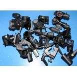 A collection of Manfrotto T clamps, tripod heads and other accessories