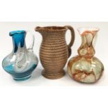 Collection of jugs to include two glass examples and a ceramic rope effect (3).