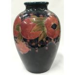 An imposing large Moorcroft pottery pomegranate vase 42cm high, signed and stamped to base.