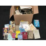 Large box containing a collection of vintage photographs and other ephemera.