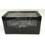 Automatic watch winder with space for 4 wristwatches. No power lead so sold untested.