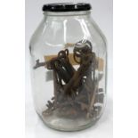 A jar of antique keys.