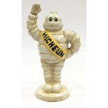 Cast Metal Michelin man figure.