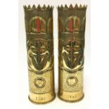 Pair of highly decorated trench art shells, 2nd World War 1944. Each measuring 37cm tall.