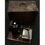 Antique Wilcox & Gibbs sewing machine complete with original wooden case.