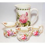 Royal Crown Derby set of three miniature jugs in the Derby Posies pattern c/w a Pierre Redoute jug