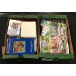 Two large boxes of Lilliput Lane catalogues, handbooks and other books.