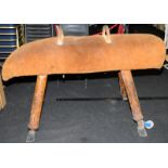 Vintage wood framed suede covered pommel/vaulting gym horse. 165cms across on height adjustable legs