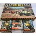 Vintage Scalextric Grand Prix 50 Set with 2 boxed A/270 hand controllers and 2 boxed C7 Rally Mini