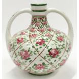 Wemyss style pottery hand painted twin handled vase painted with roses. Impressed numbers to base
