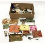 Box of miscellaneous tins with other curios.