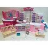 A selection of various Barbie house furniture items to include seats - shop units - sink units