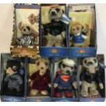 7 X Meerkat boxed toys. To include - Superman - Batman - Safari Oleg - Bogdan etc.