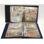 240+ banknotes in two albums (Blue & Black).