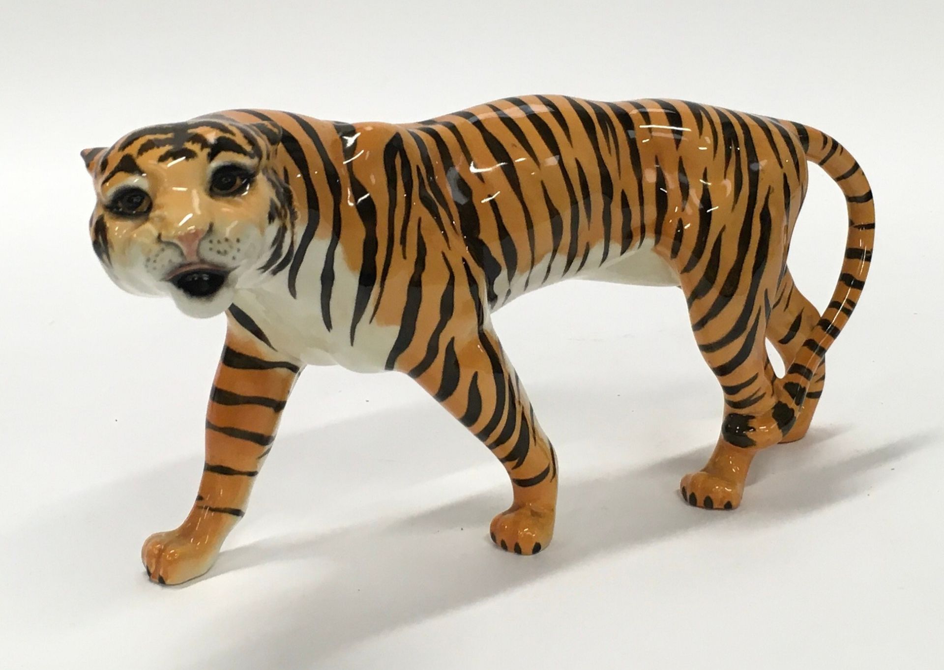 Beswick tigress ornament with markings 23cm long.