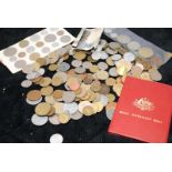 Quantity of foreign coinage including vintage contained within a Veteran series money box with key