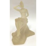 An Art Deco style resin figurine of a seated lady 34cm tall.