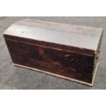 Vintage dome top pine traveling/seamans trunk with drop handles containing a large collection of