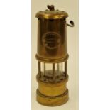 Contemporary brass miners safety lamp 19cm tall.