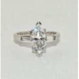 A 925 silver and CZ ring, Size P.