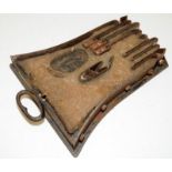 Antique industrial glove cutting mould. Used for cutting leather in the shape of gloves prior to
