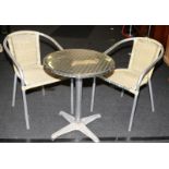 Cafe style table with two chairs. Table height 70cms
