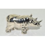 A well cast silver rhino figure.