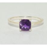 A 925 silver and amethyst ring Size N.