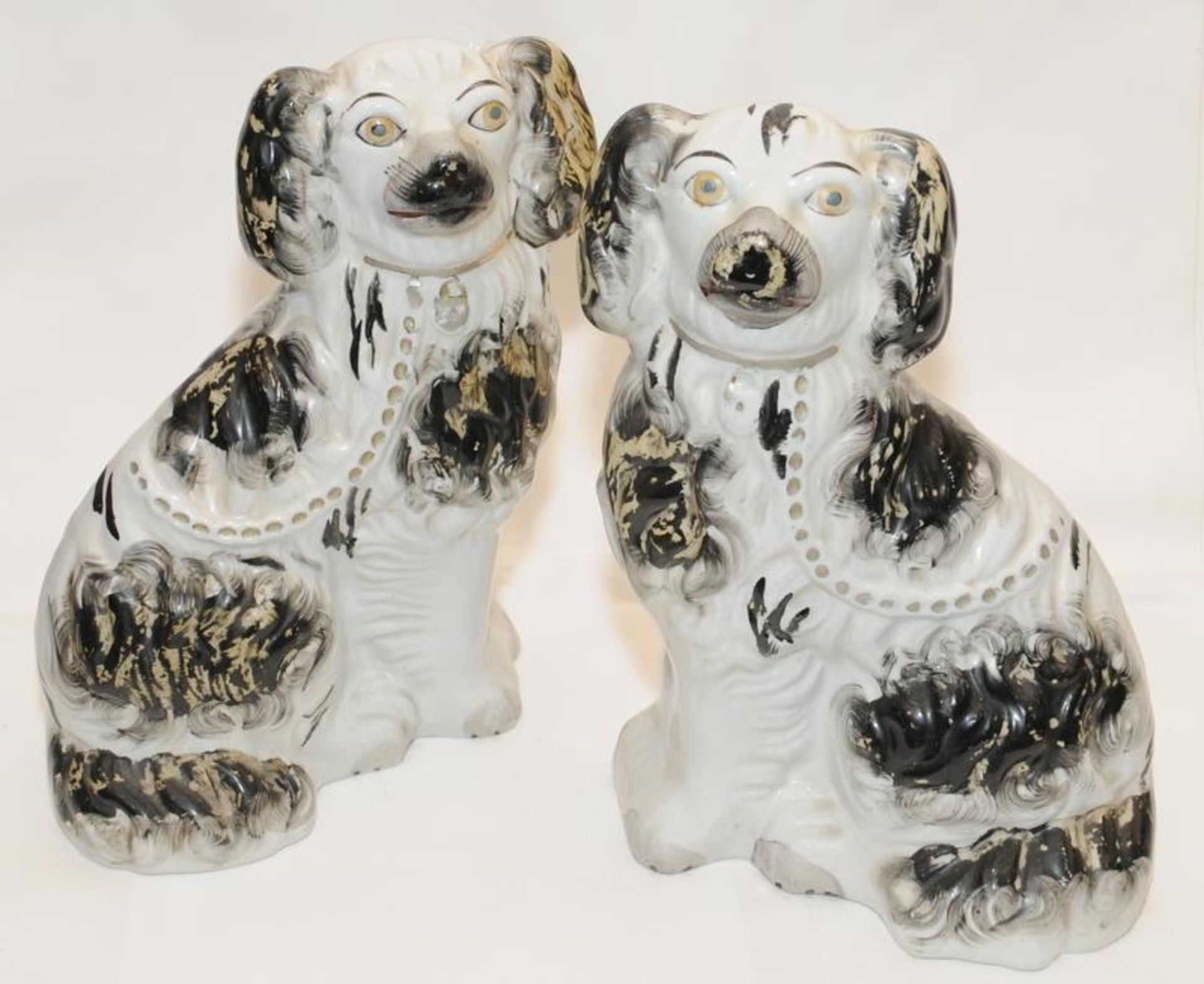 Pair of vintage Staffordshire flat back dogs